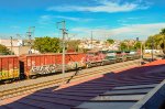 FXE AC4400 Locomotives leading a mixed freight train